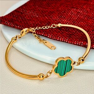 Anthropologie Green Flower Lucky Clover Charm Band Adjustable Bracelet in Gold